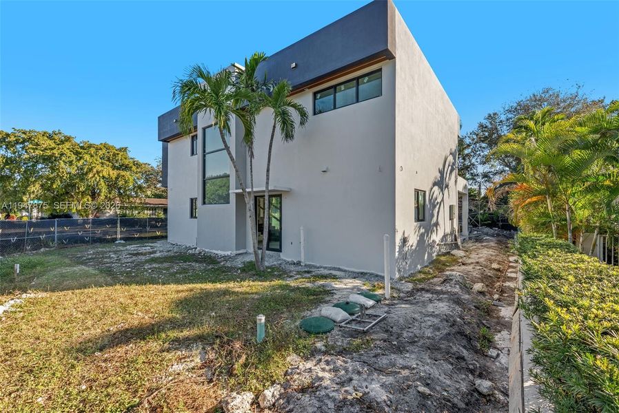 Exterior details and patio area of a home in , Miami Shores (Image 6). Exterior details and patio area of a home in , Miami Shores (Image 6).