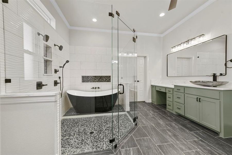 Bathroom featuring vanity, separate shower and tub, crown molding, and ceiling fan