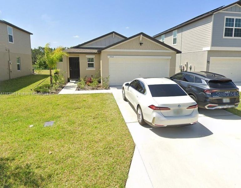 Front exterior of a new home in , Plant City, FL, highlighting curb appeal (Image 1). Front exterior of a new home in , Plant City, FL, highlighting curb appeal (Image 1).