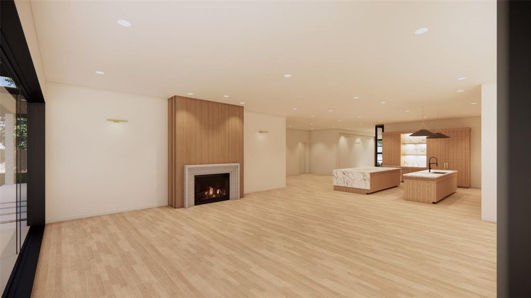 Living room angle with view of kitchen and entracne hall.