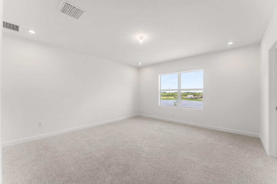 Spacious, unfurnished interior of a new home in Tradition - Cadence, Port St. Lucie (Image 16).