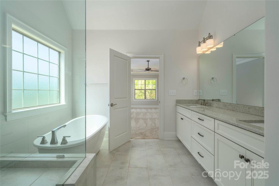 Please Note Photos are of completed home with similar finishes.   Plan to be reversed on this homesite