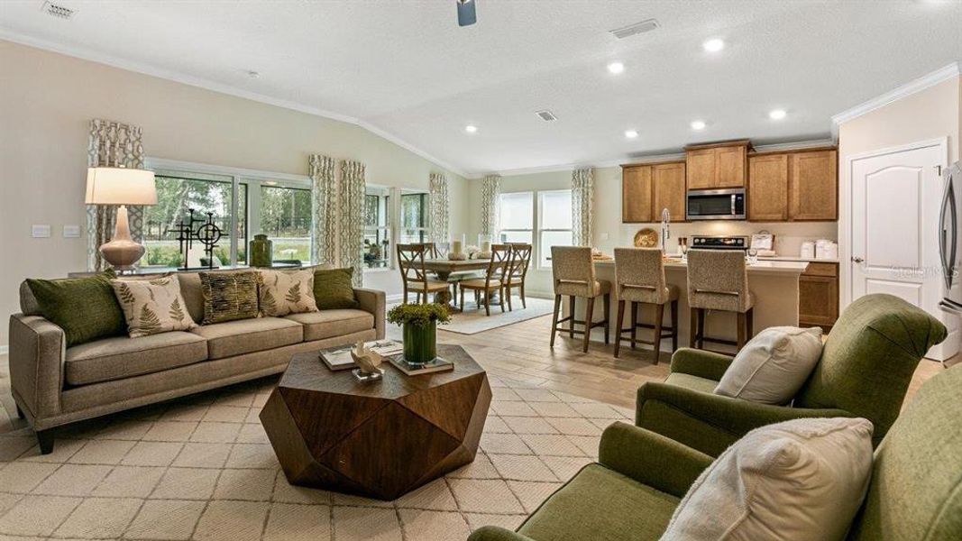 Furnished interior view inside a new home in Sawmill Branch Express, Palm Coast (Image 6).