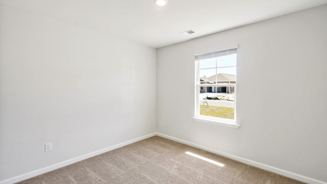 Spacious, unfurnished interior of a new home in Lockwood Landing, Supply (Image 13). Spacious, unfurnished interior of a new home in Lockwood Landing, Supply (Image 13).