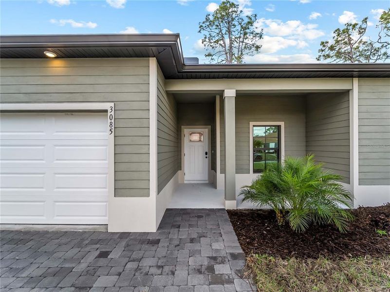 Exterior details and patio area of a home in , North Port (Image 31).
