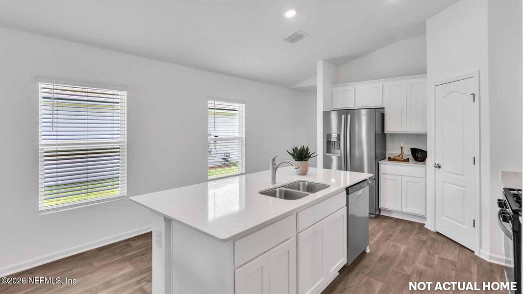 Furnished interior view inside a new home in Grand Reserve, Bunnell (Image 6).