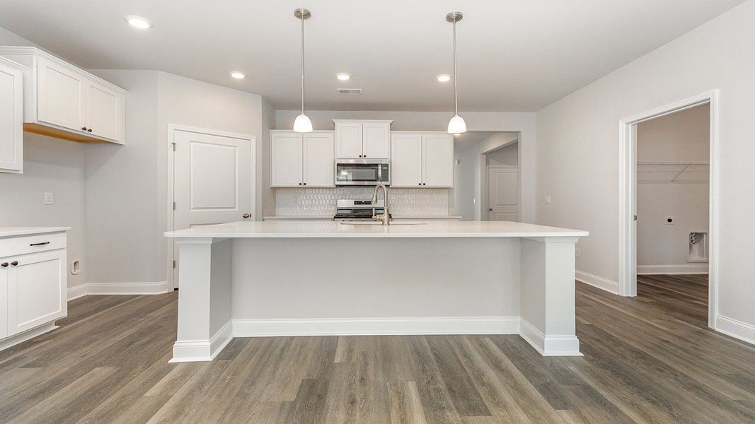 Representative furnished interior of a home built from the Darby by D.R. Horton in The Bluffs at Mill Creek, Florence (Image 5).