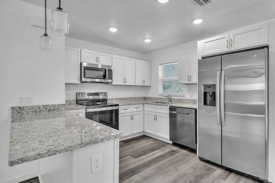Furnished interior view inside a new home in , Punta Gorda (Image 11).