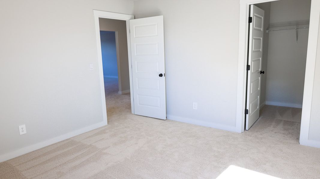 Representative unfurnished interior of a home built from the STONEBROOK II by D.R. Horton in Harvest Point, Spring Hill (Image 52).