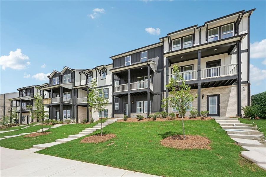 Front exterior of a new home in , Cumming, GA, highlighting curb appeal (Image 30).