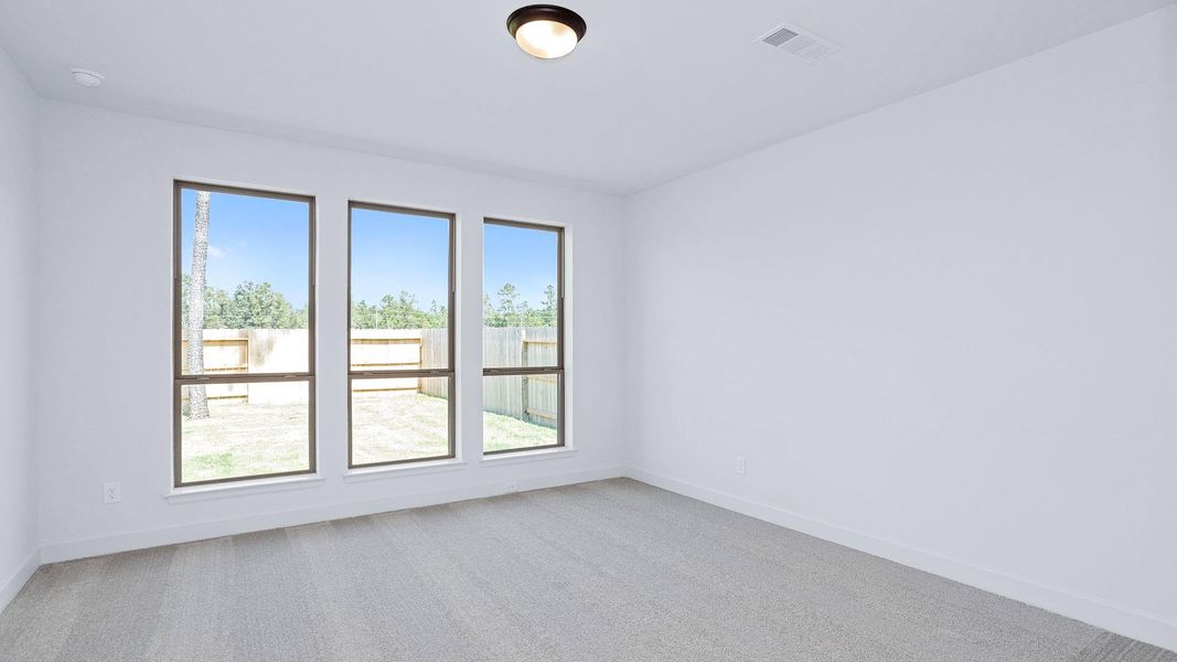 Spacious, unfurnished interior of a new home in Evergreen 50', Conroe (Image 8).
