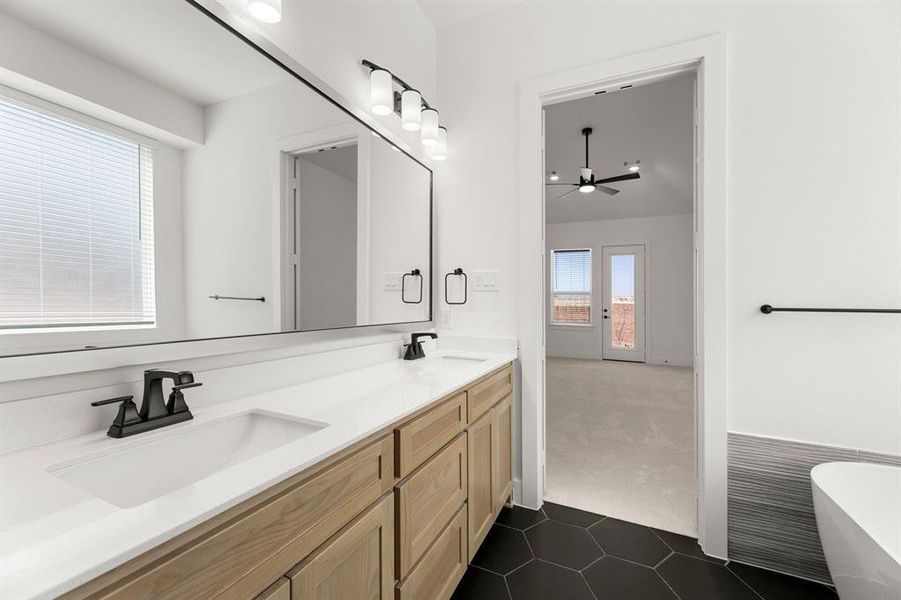 Furnished interior view inside a new home in The Villages of Hurricane Creek, Anna (Image 6).