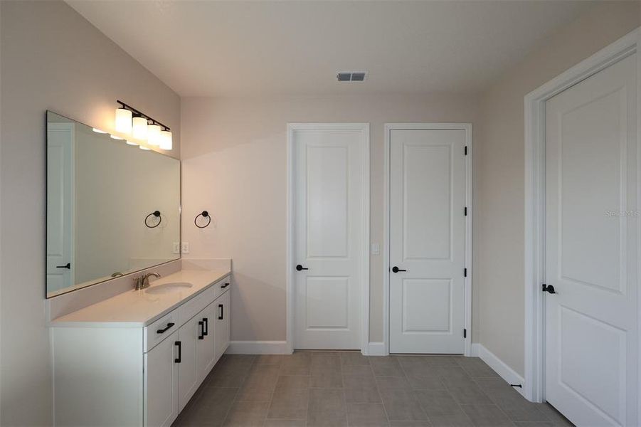 Furnished interior view inside a new home in Solace at Corner Lake, Orlando (Image 12). Furnished interior view inside a new home in Solace at Corner Lake, Orlando (Image 12).