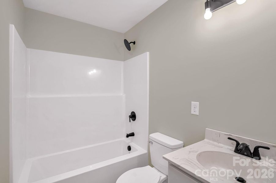 Furnished interior view inside a new home in , Waynesville (Image 6).
