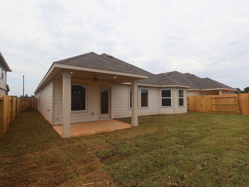 Exterior details and patio area of a home in Lone Star Landing, Montgomery (Image 29).