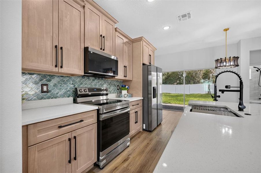Furnished interior view inside a new home in , Poinciana (Image 13).