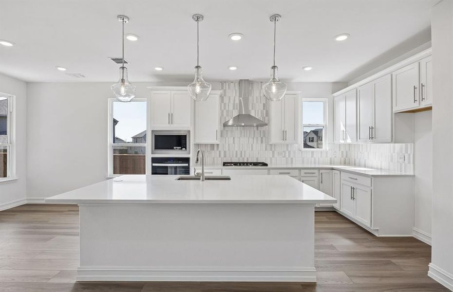 Kitchen with eat-in bartop island