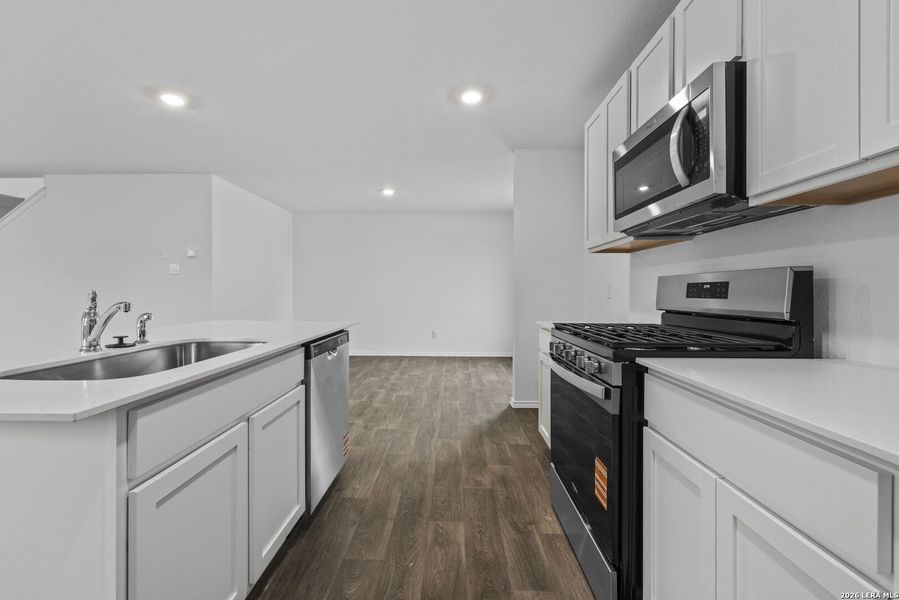 Furnished interior view inside a new home in Avenida, Converse (Image 9).