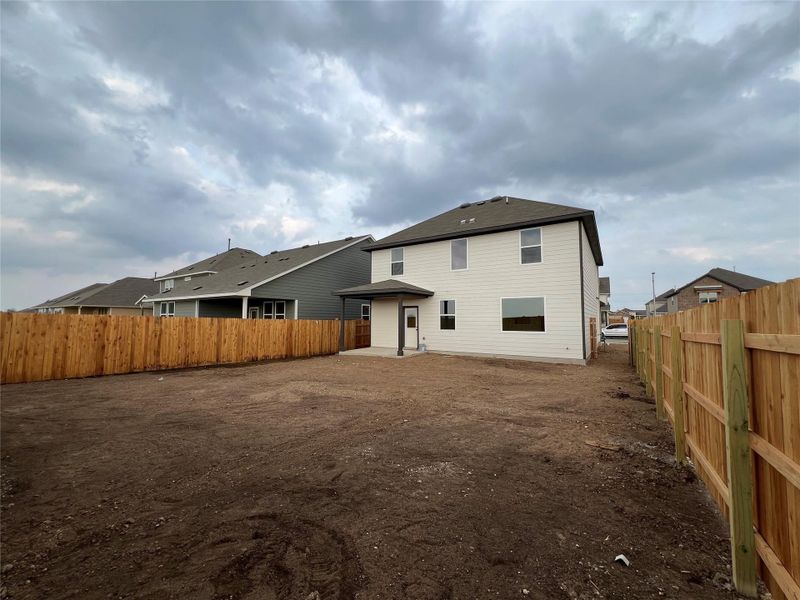 Exterior details and patio area of a home in Rolling Glen, Hutto (Image 19).