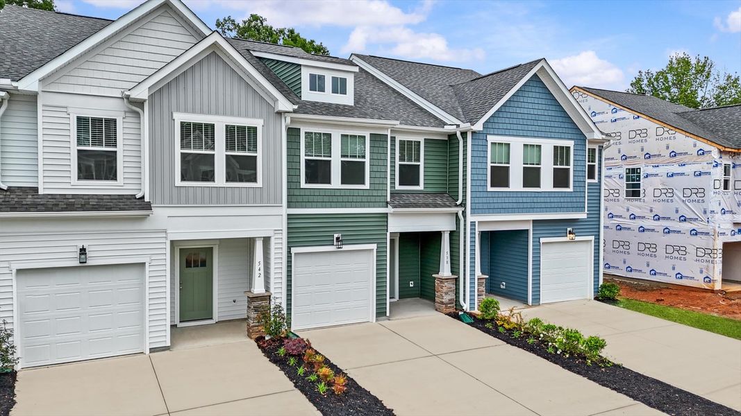 Two story townhome with stone column at Ransdell Pointe by DRB Homes in Spartanburg, SC Two story townhome with stone column at Ransdell Pointe by DRB Homes in Spartanburg, SC