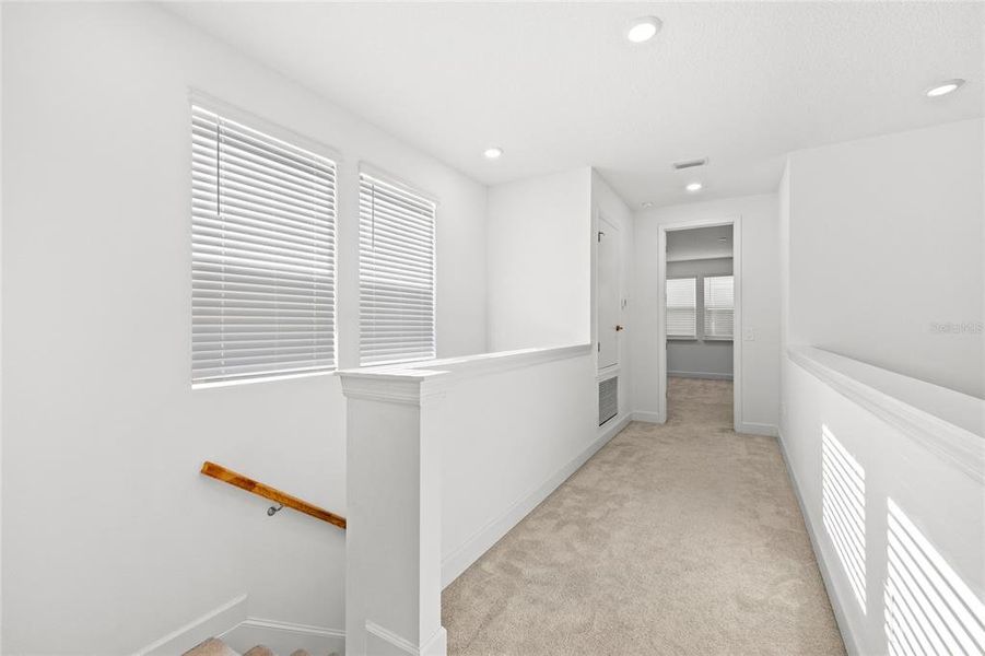 Spacious, unfurnished interior of a new home in Harvest At Ovation 50s, Winter Garden (Image 29).