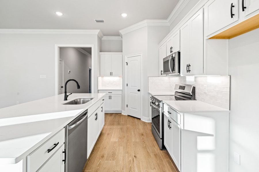 Furnished interior view inside a new home in Eagle Pointe, Pensacola (Image 6). Furnished interior view inside a new home in Eagle Pointe, Pensacola (Image 6).