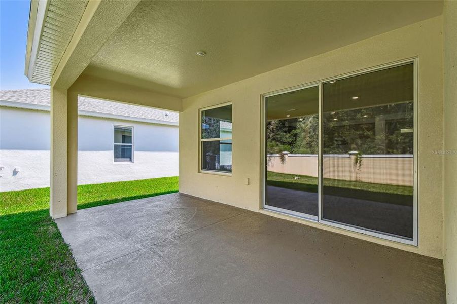 Exterior details and patio area of a home in Cascades at Southern Hills, Brooksville (Image 25).