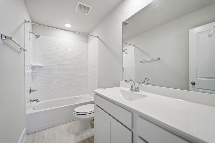 Furnished interior view inside a new home in Sunterra Lakes, Brookshire (Image 18).