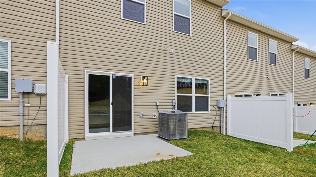 Exterior details and patio area of a home in Cherokee Crossing, Kodak (Image 2).