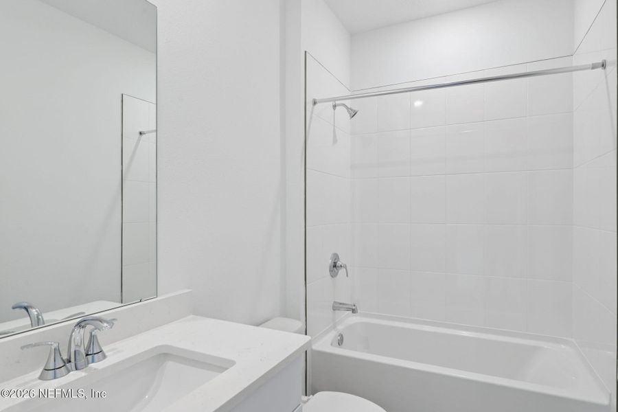 Furnished interior view inside a new home in Colbert Landings, Palm Coast (Image 10).