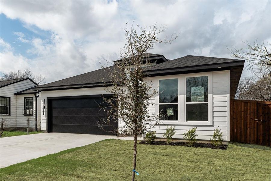 Front exterior of a new home in , Dallas, TX, highlighting curb appeal (Image 19).
