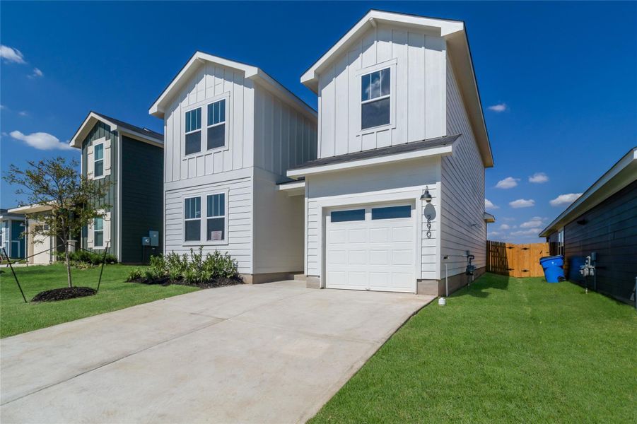 Front exterior of a new home in Marigold, Uhland, TX, highlighting curb appeal (Image 2). Front exterior of a new home in Marigold, Uhland, TX, highlighting curb appeal (Image 2).
