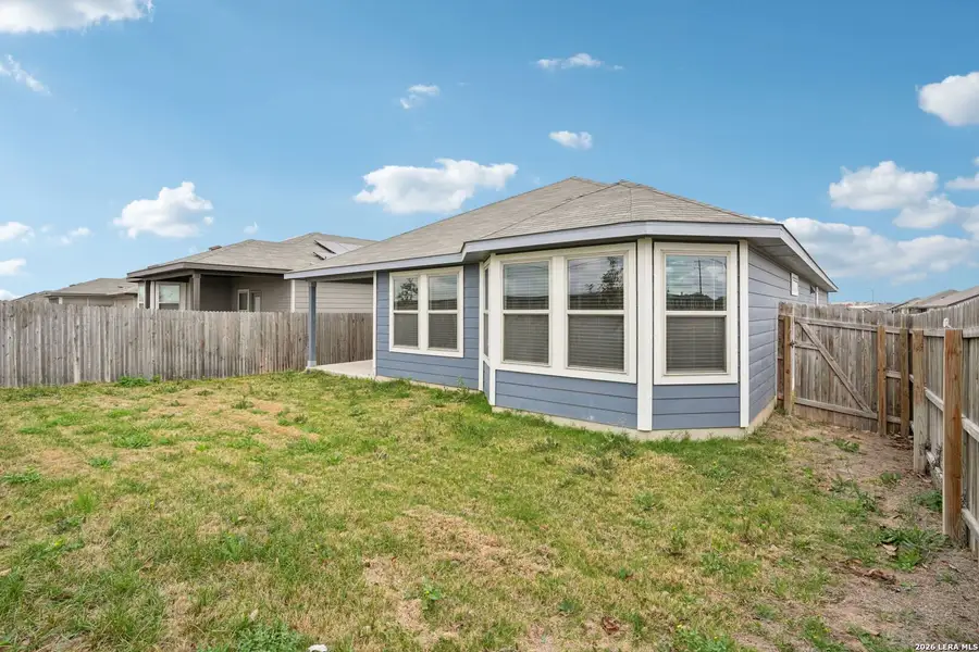 Exterior details and patio area of a home in Catalina, Converse (Image 4).