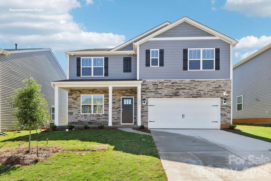 Front exterior of a new home in Clark Creek Landing, Lincolnton, NC, highlighting curb appeal (Image 2). Front exterior of a new home in Clark Creek Landing, Lincolnton, NC, highlighting curb appeal (Image 2).