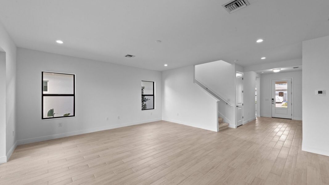 Spacious, unfurnished interior of a new home in SkySail, Naples (Image 17).