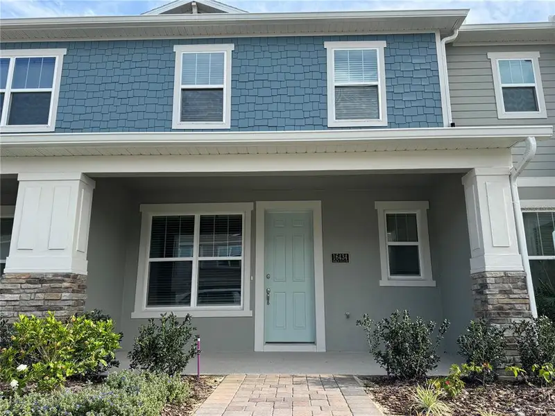 Exterior details and patio area of a home in Hamlin Ridge, Winter Garden (Image 21).