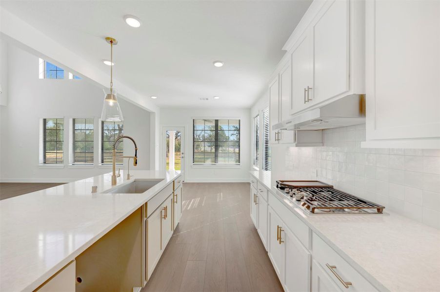 Furnished interior view inside a new home in The Oaks on 6th Street, Magnolia (Image 8).