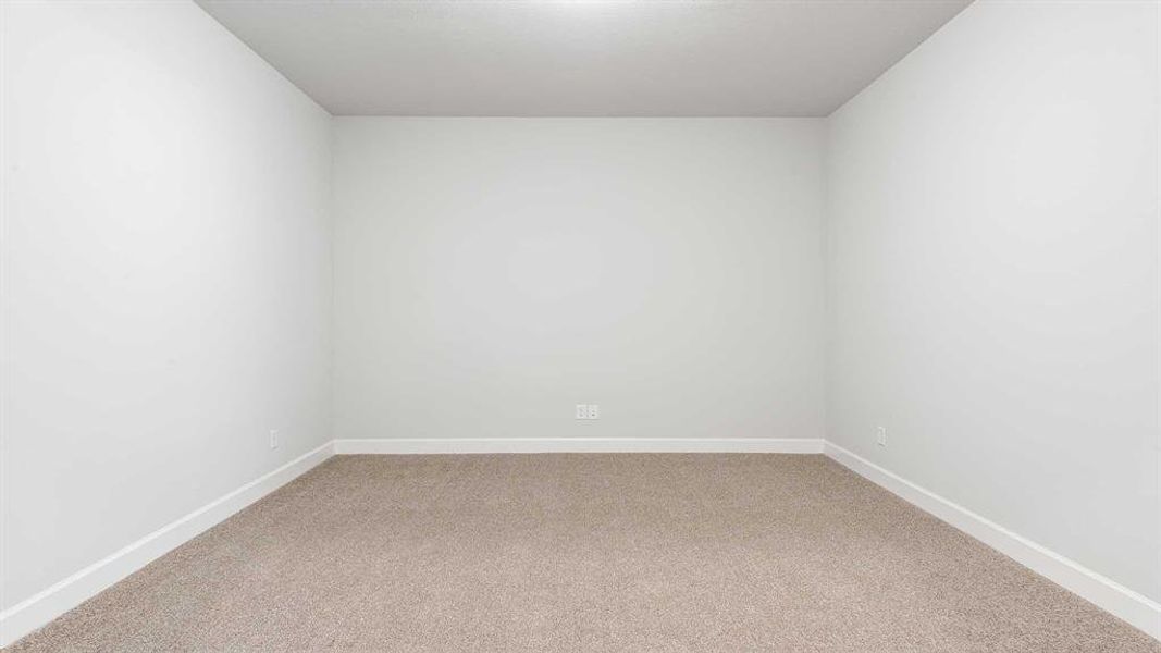 Empty room featuring carpet