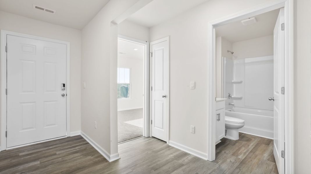 Spacious, unfurnished interior of a new home in Bentley Park, Greenwood (Image 13). Spacious, unfurnished interior of a new home in Bentley Park, Greenwood (Image 13).