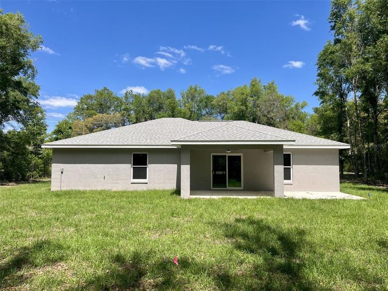 Exterior details and patio area of a home in , Ocklawaha (Image 3).