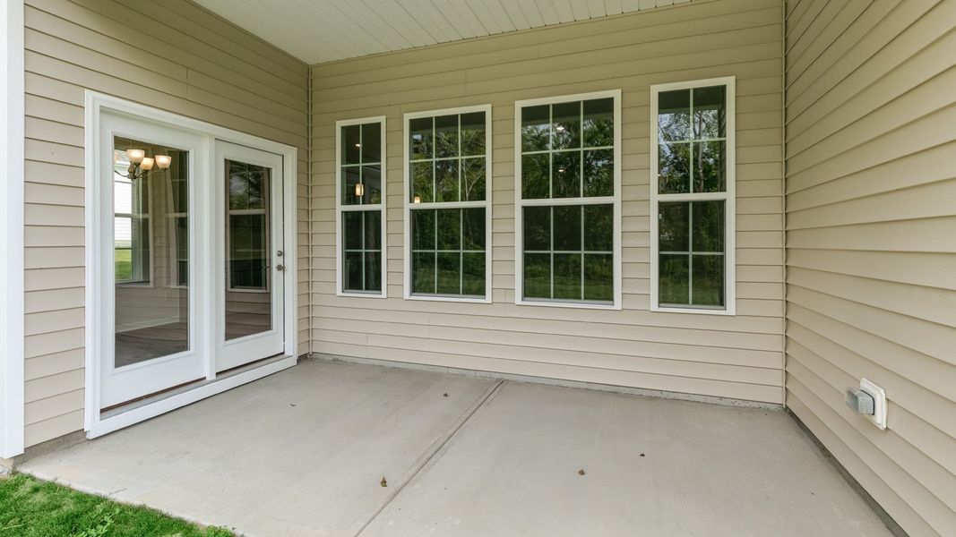 Exterior details and patio area of a home in The Villas at Martin Farms, Aberdeen (Image 4).