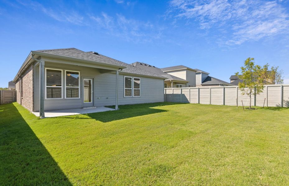 Exterior details and patio area of a home in Treeline, Justin (Image 1). Exterior details and patio area of a home in Treeline, Justin (Image 1).