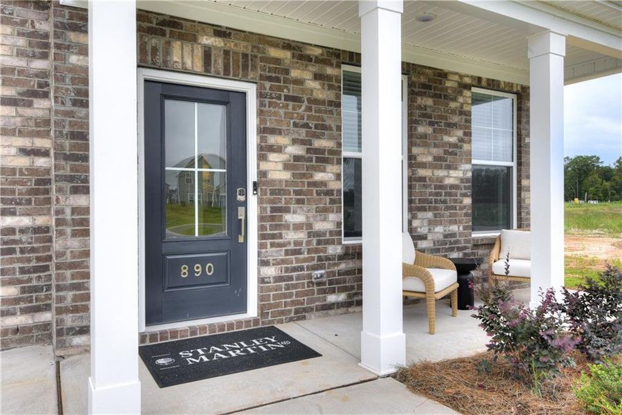Exterior details and patio area of a home in River Oaks, Locust Grove (Image 3). Exterior details and patio area of a home in River Oaks, Locust Grove (Image 3).