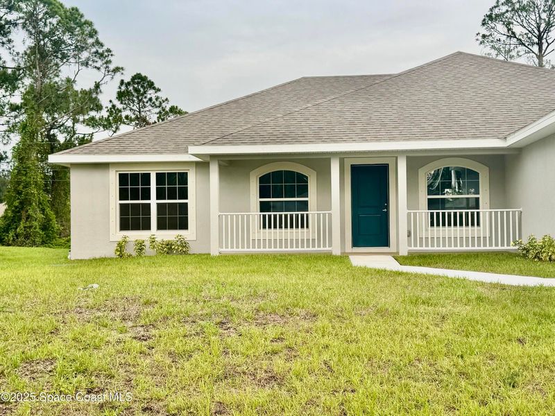 Exterior details and patio area of a home in Palm Bay, Palm Bay (Image 2).