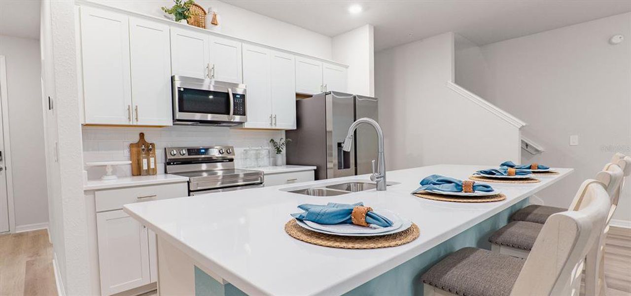 Furnished interior view inside a new home in Ralston Reserve at Siena, St. Cloud (Image 6).
