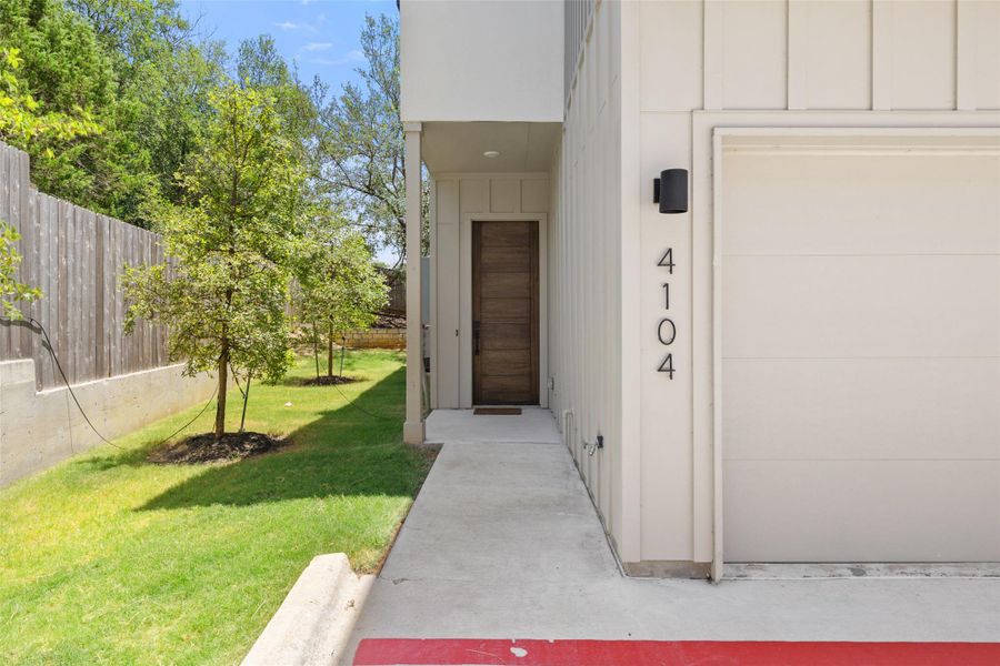 Property entrance featuring board and batten siding Property entrance featuring board and batten siding
