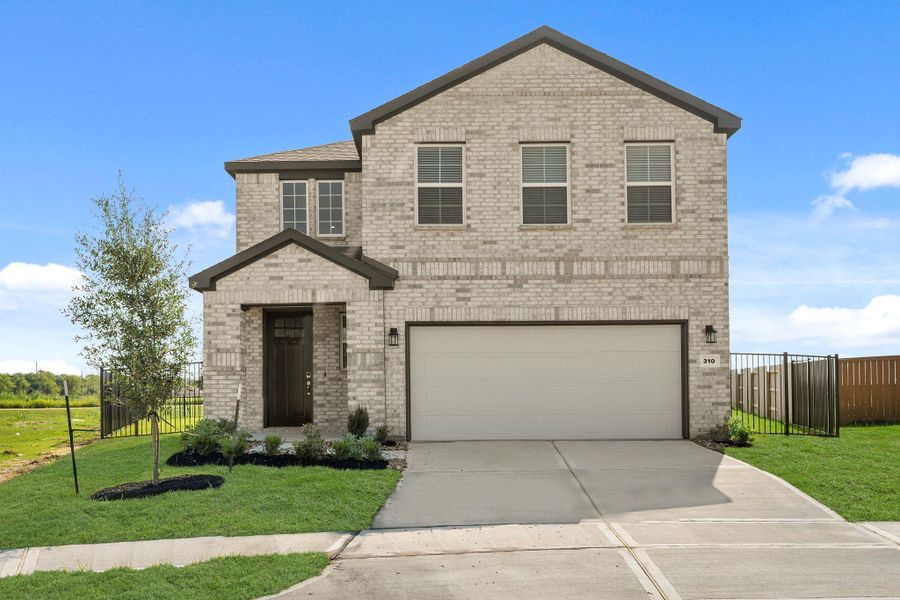 Front exterior of a new home in River Ranch Trails, Dayton, TX, highlighting curb appeal (Image 2). Front exterior of a new home in River Ranch Trails, Dayton, TX, highlighting curb appeal (Image 2).