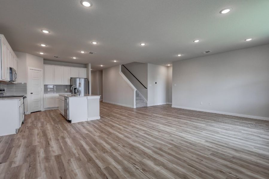 A large empty kitchen. A large empty kitchen.
