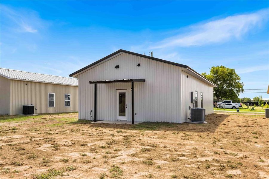 Rear view of house featuring a patio Rear view of house featuring a patio