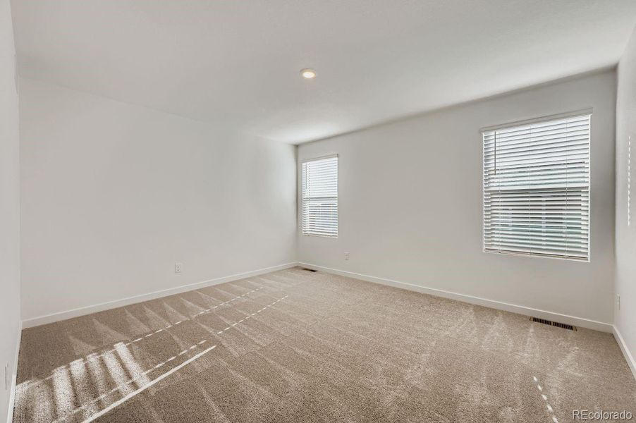 Spacious, unfurnished interior of a new home in Copper Chase: The Celestial Collection, Colorado Springs (Image 8).